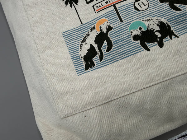 Sunshine Floating Club Double Pocket Manatee Tote Bag