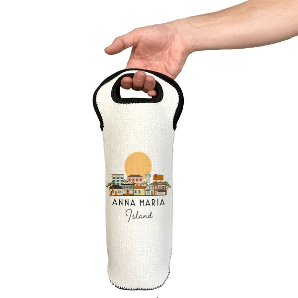 Hand holding a white wine bottle bag with 'Anna Maria Island' design on a white background