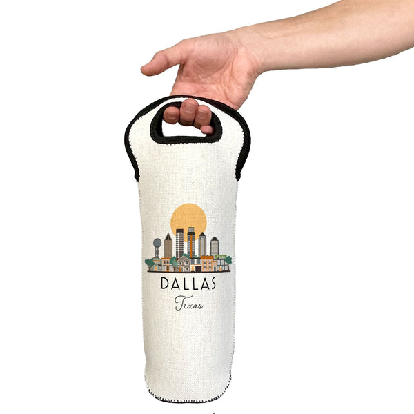 Hand holding a white wine bottle bag with 'Dallas, Texas' text and skyline design.