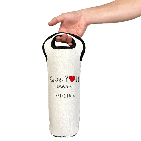 Hand holding a white wine bottle bag with text and a heart symbol on a white background