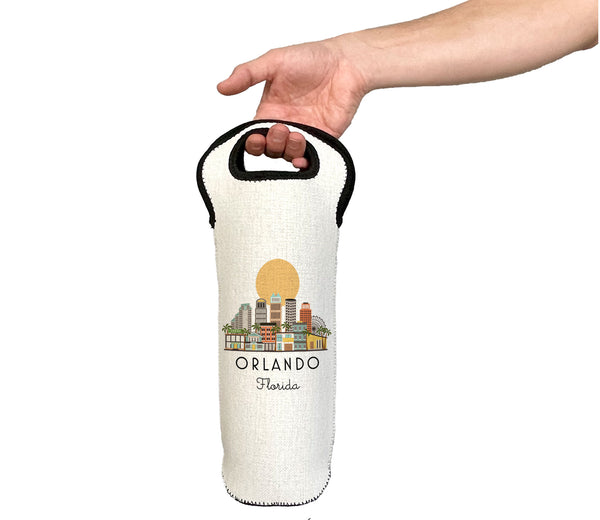 White wine bottle holder with Orlando, Florida design held by a hand on a white background