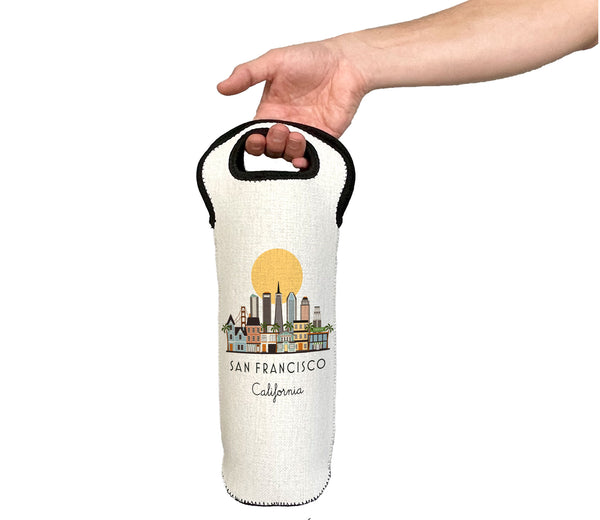 Hand holding a white wine bottle holder with 'San Francisco, California' design on a white background