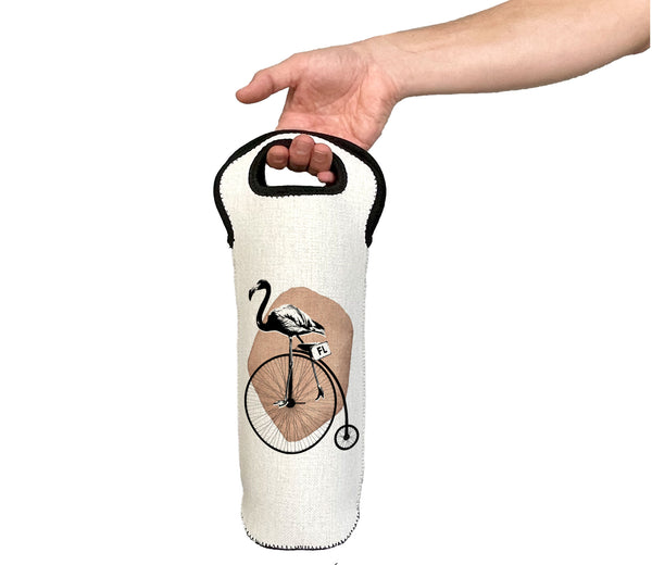 Hand holding a white wine bag with a bicycle and flamingo design on a white background