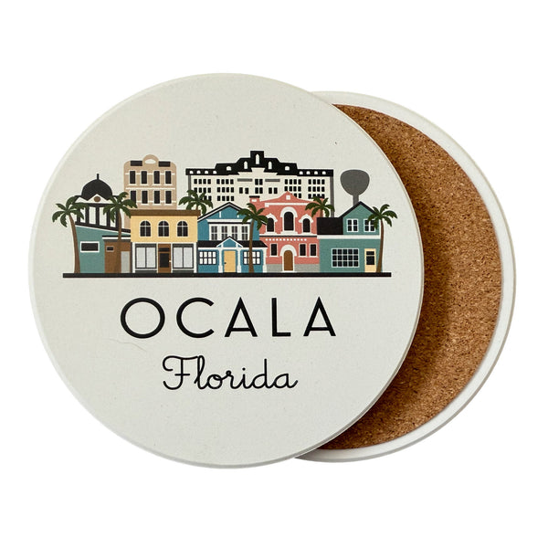 Ceramic coaster with cork backing featuring a cityscape illustration and 'Ocala Florida' text on a white background.