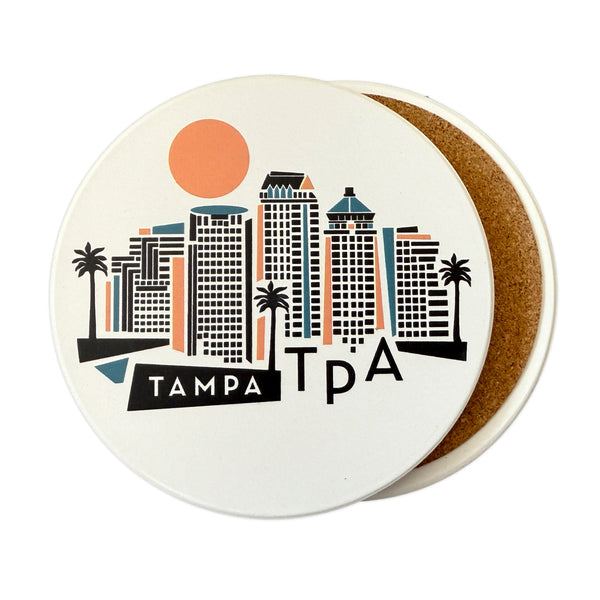 Ceramic coaster with Tampa skyline design on a white background