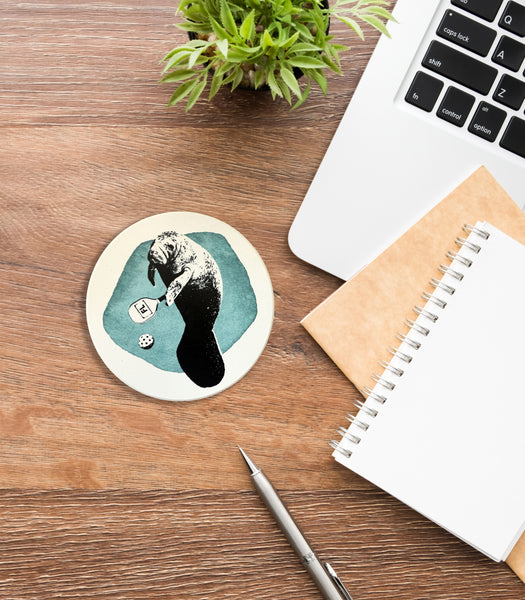 Manatee Playing Pickleball Absorbent Flat Ceramic Coaster with Cork Backing