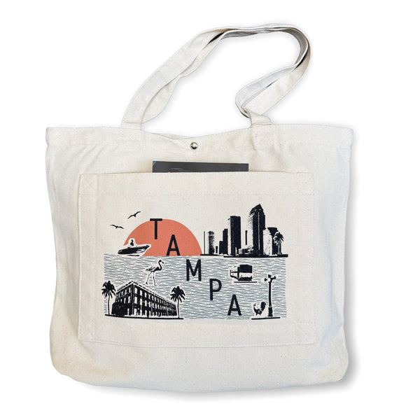 Tote bag with a graphic of Tampa's skyline on a white background